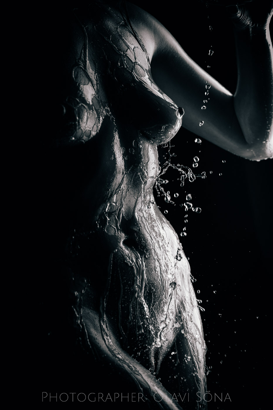 splash of water against nude body